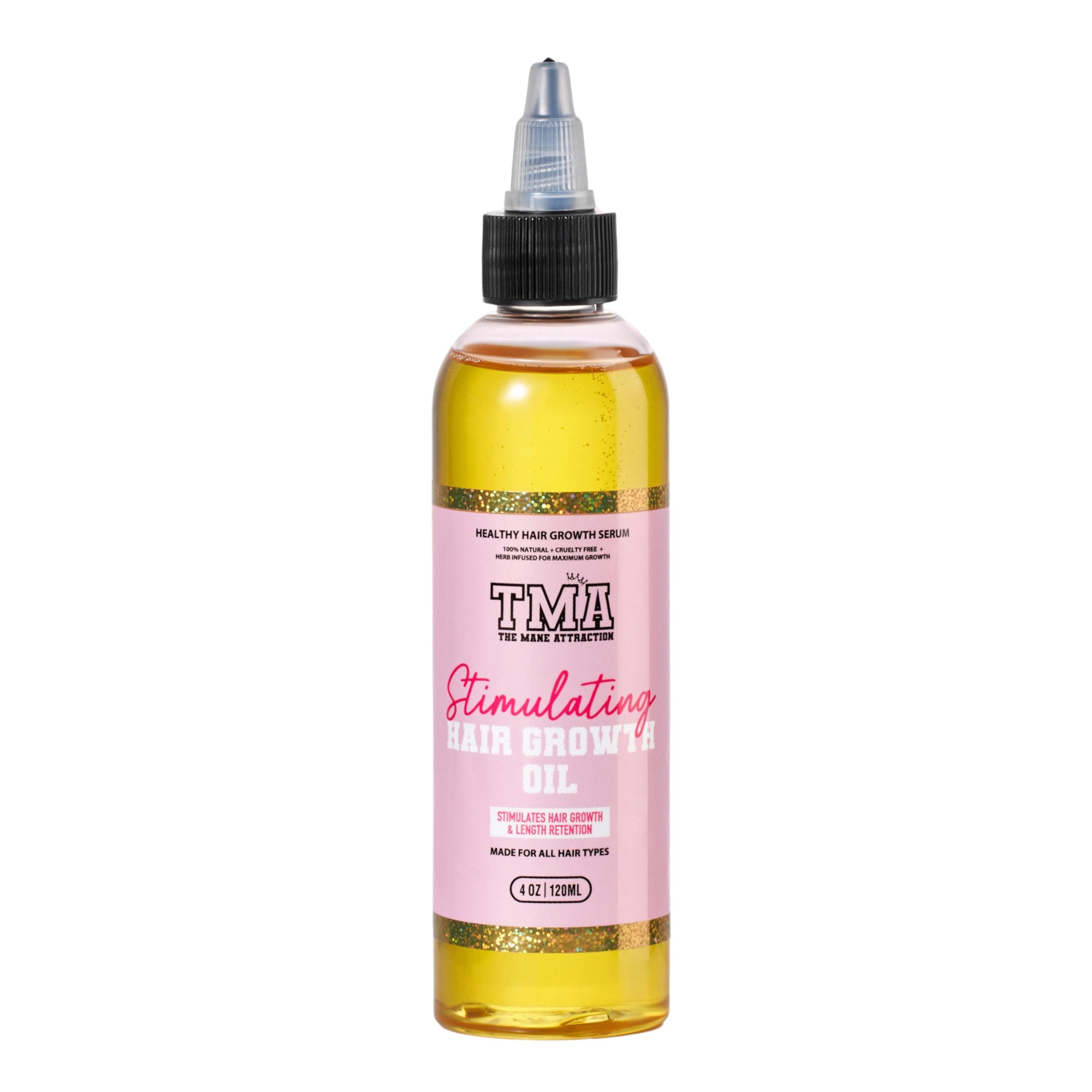 The Mane Attraction hair oil bottle being poured for scalp hydration.