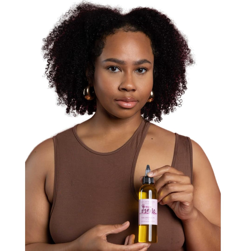The Mane Attraction hair oil soothing the scalp with a gentle formula.