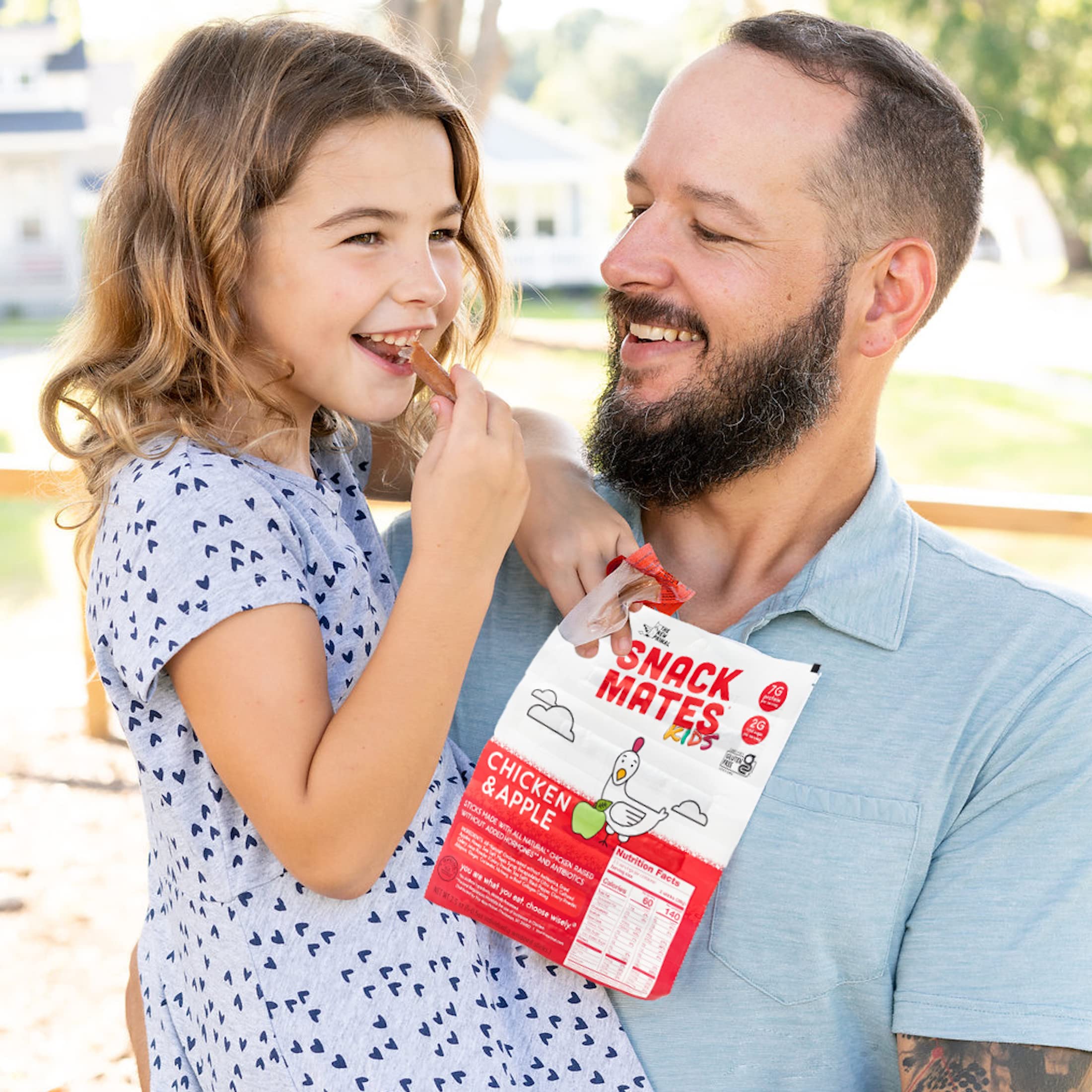 Dried apple bits visible in The New Primal Chicken and Apple Stick for a natural snack.