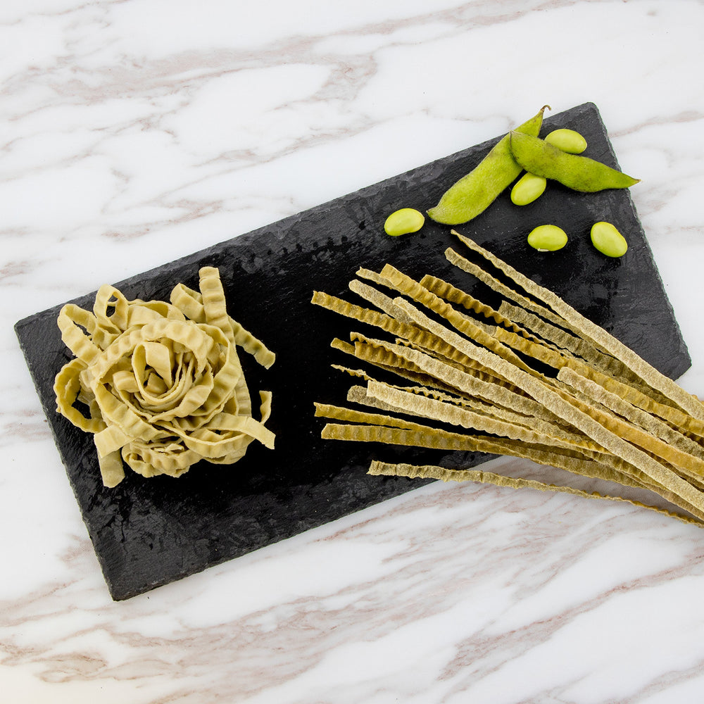 Kitchen scene with The Only Bean Edamame Fettuccine ready to cook