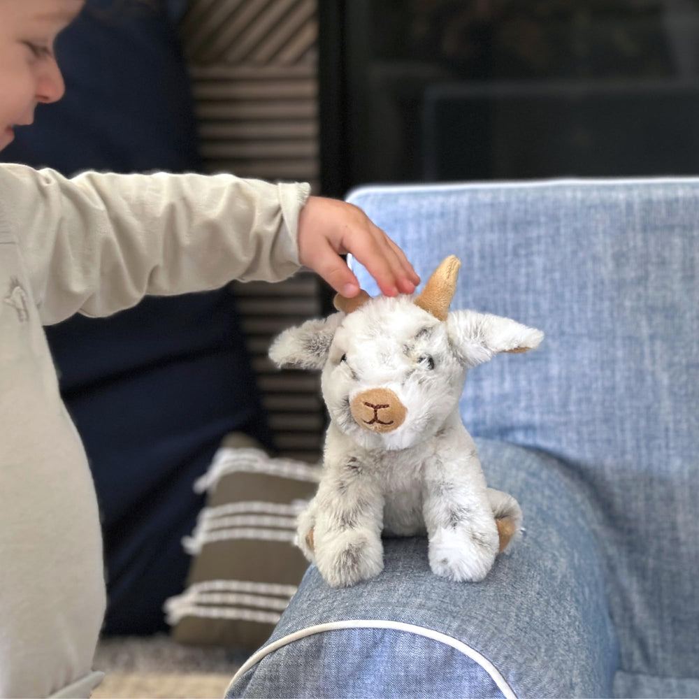 The Petting Zoo goat stuffed toy features durable stitching.