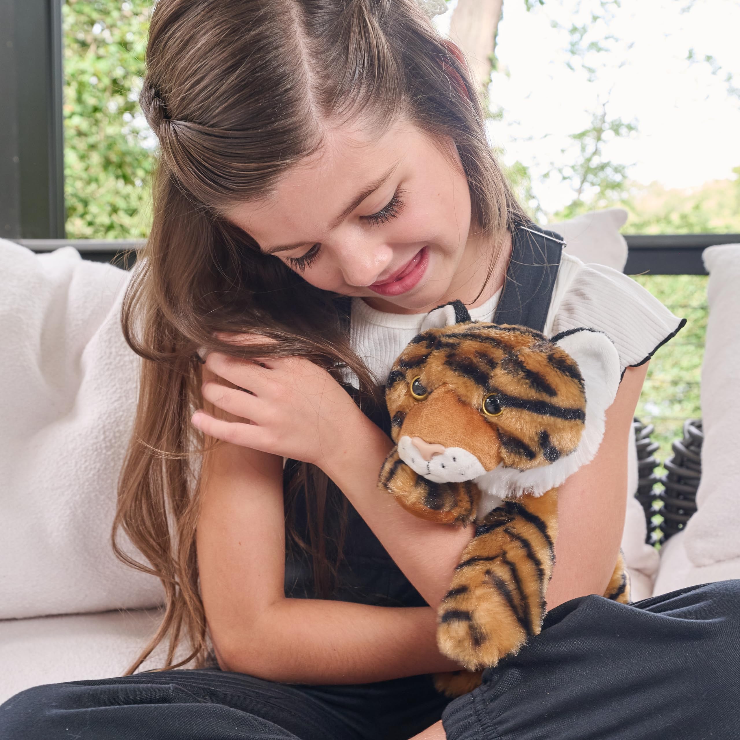 The Petting Zoo tiger plush in safari playtime scene.