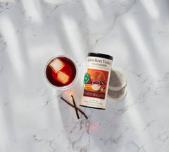 Packaging for The Republic of Tea Good Hope Vanilla Red Tea highlights vanilla aroma and caffeine-free rooibos.