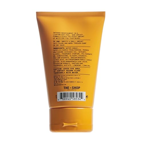 The Shop Uninterrupted beard cream texture close-up shows rich, non-greasy coverage.