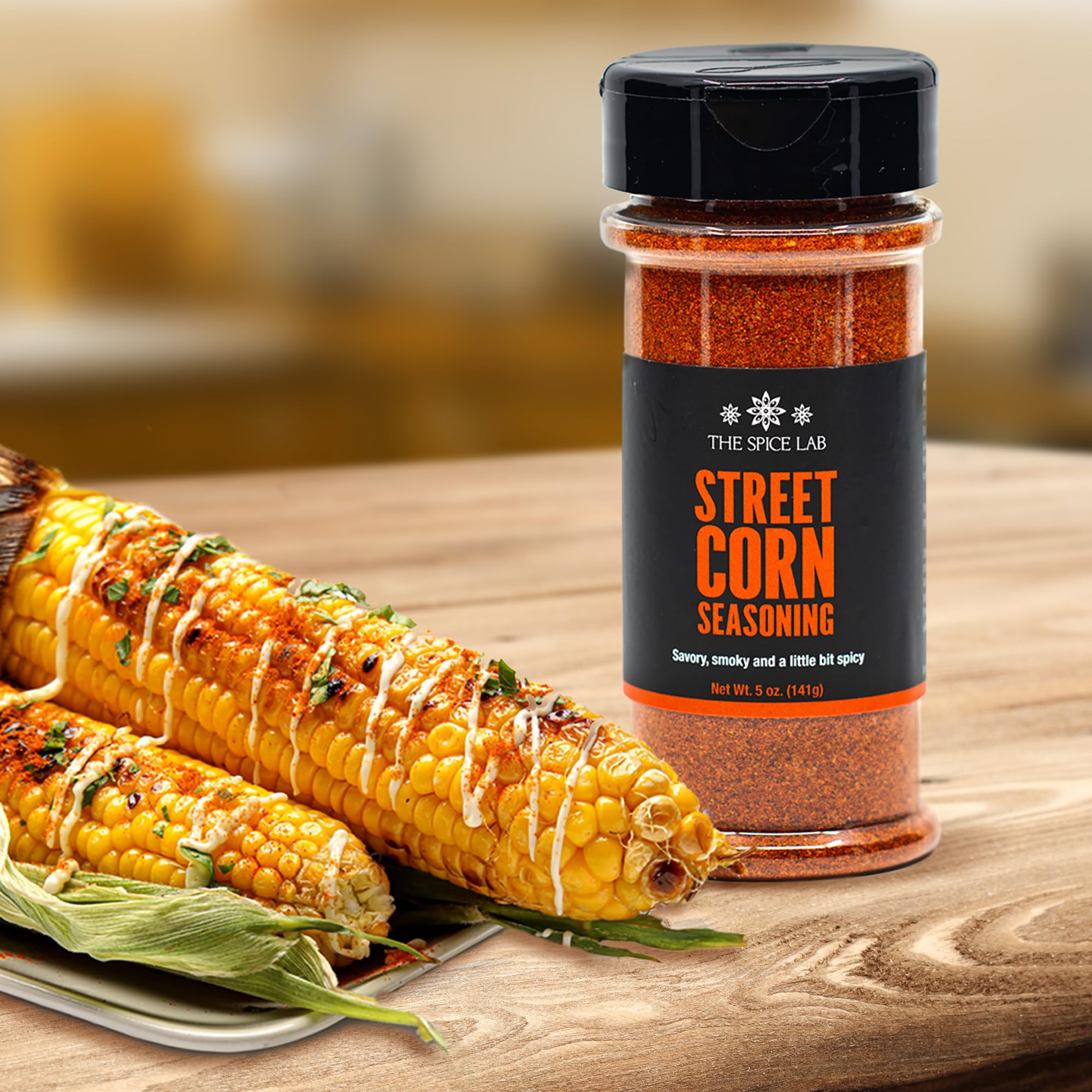 Grilled corn dusted with The Spice Lab elote seasoning for authentic flavor