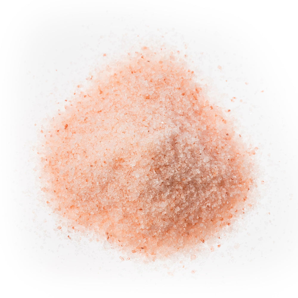 The Spice Lab Himalayan Salt sprinkled on a dish for enhanced flavor.