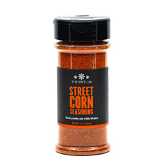 The Spice Lab Mexican Street Corn Seasoning bottle shows vendor inspired elote flavor for home use