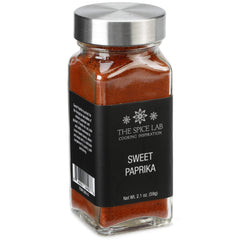 The Spice Lab Sweet Paprika Powder jar shows vibrant red color for rich flavor.