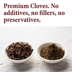 The Spice Way whole cloves held in hand for versatile seasoning.