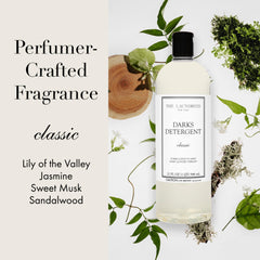 The Laundress Darks Detergent 32oz packaging emphasizing lightweight, easy dosing