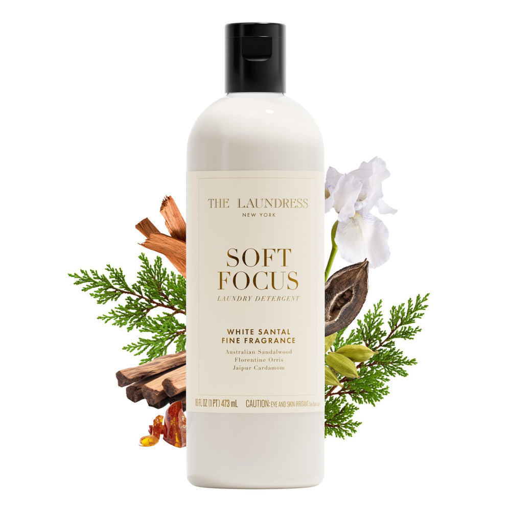 The Laundress Soft Focus bottle pours, releasing long lasting White Santal fragrance.