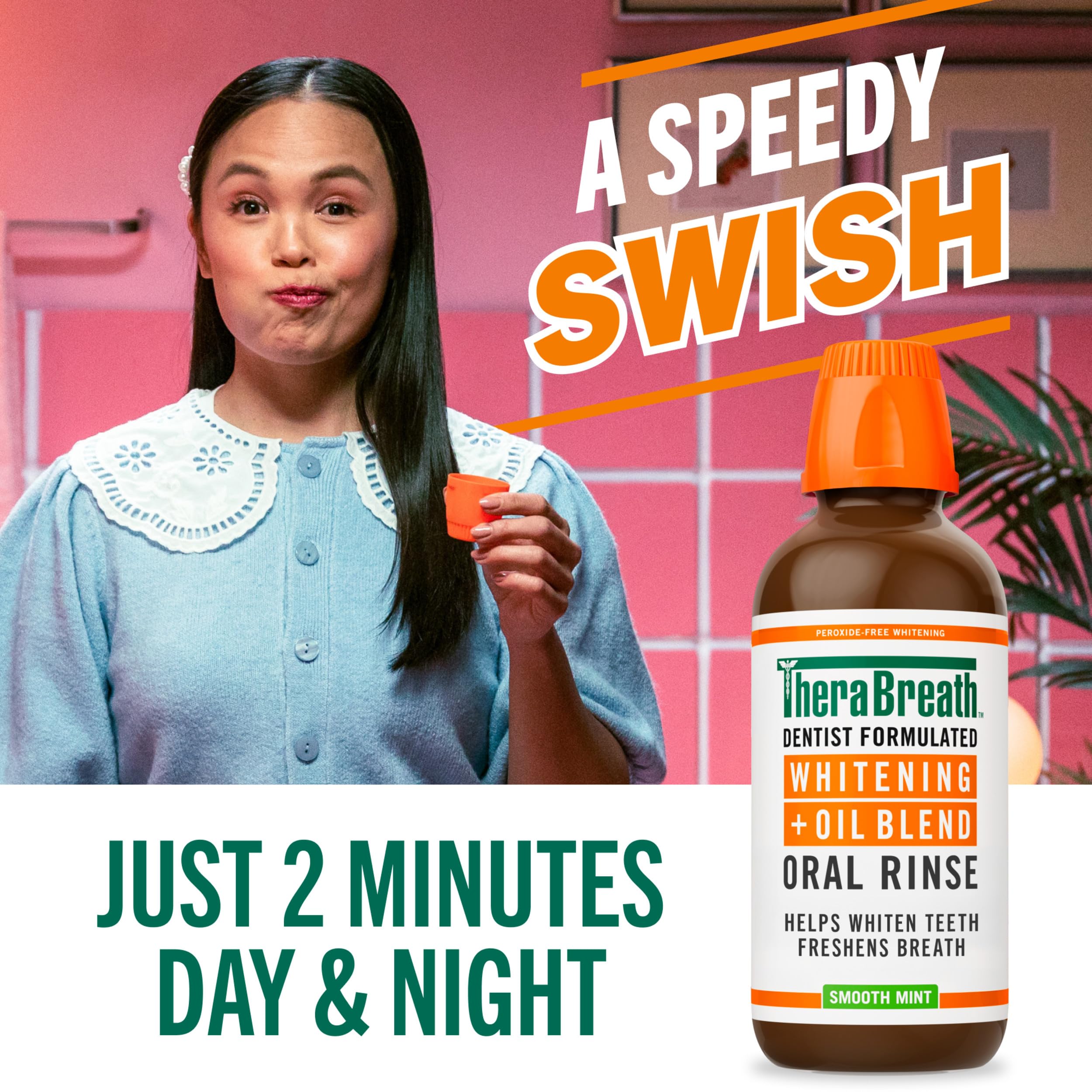 TheraBreath Oral Rinse bottle label with vegan and BPA-free packaging.