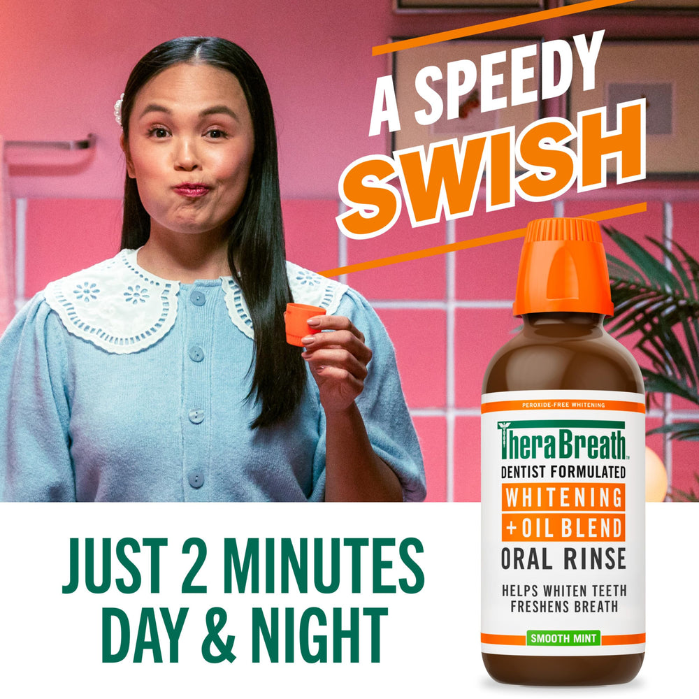 TheraBreath Oral Rinse bottle label with vegan and BPA-free packaging.