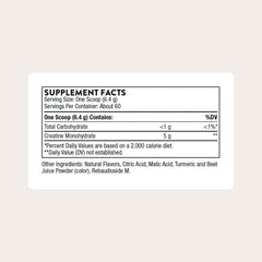 Scoop beside THORNE Creatine bottle, indicating easy daily dosing.