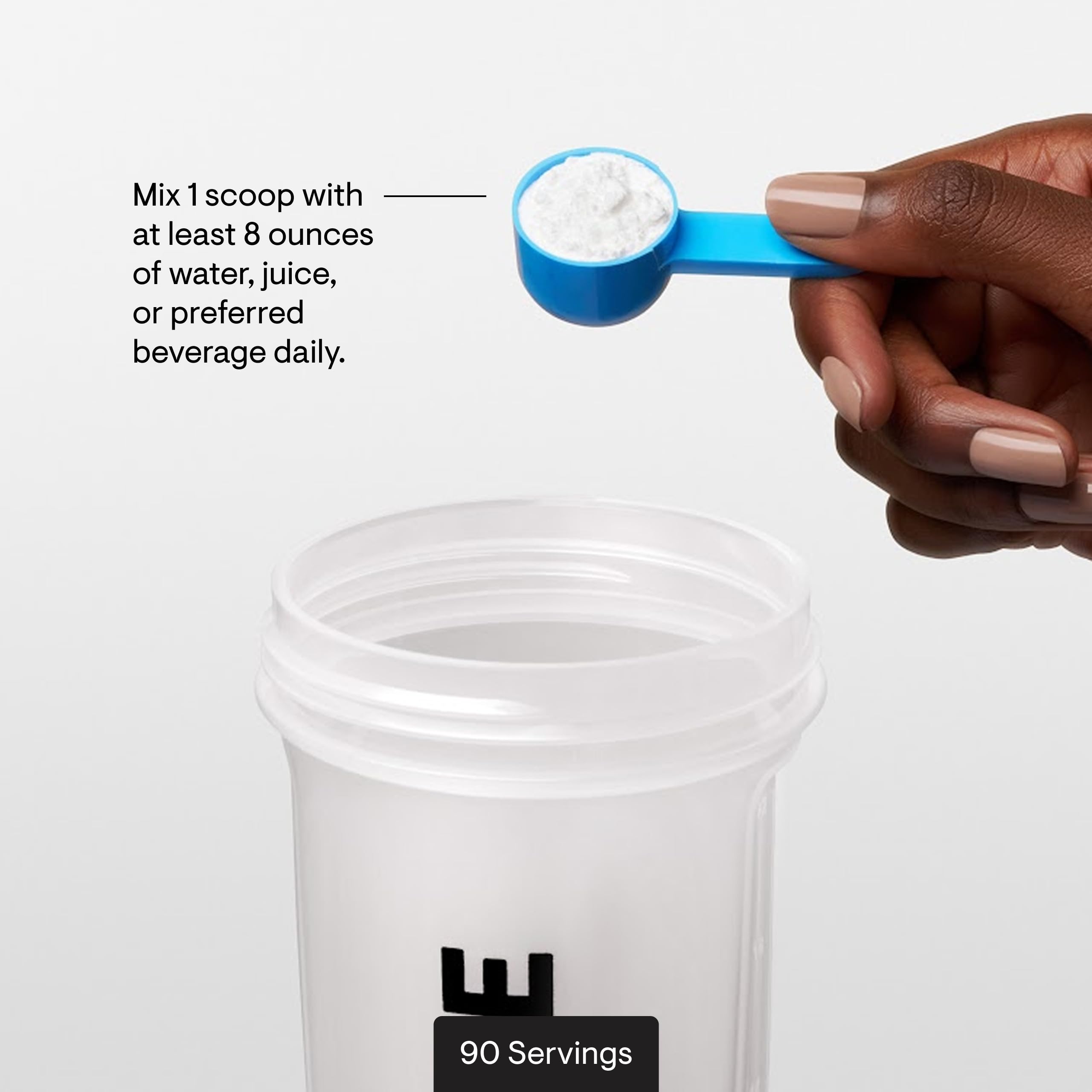 THORNE L-Glutamine container on a kitchen counter ready to mix