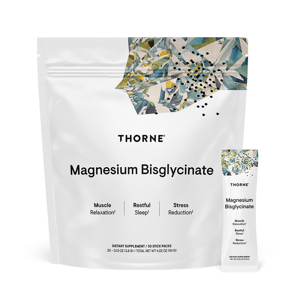 THORNE Magnesium Bisglycinate bottle on a kitchen counter, supporting daily wellness.