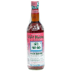 Three Crabs Brand Fish Sauce bottle with rich umami color for marinades.