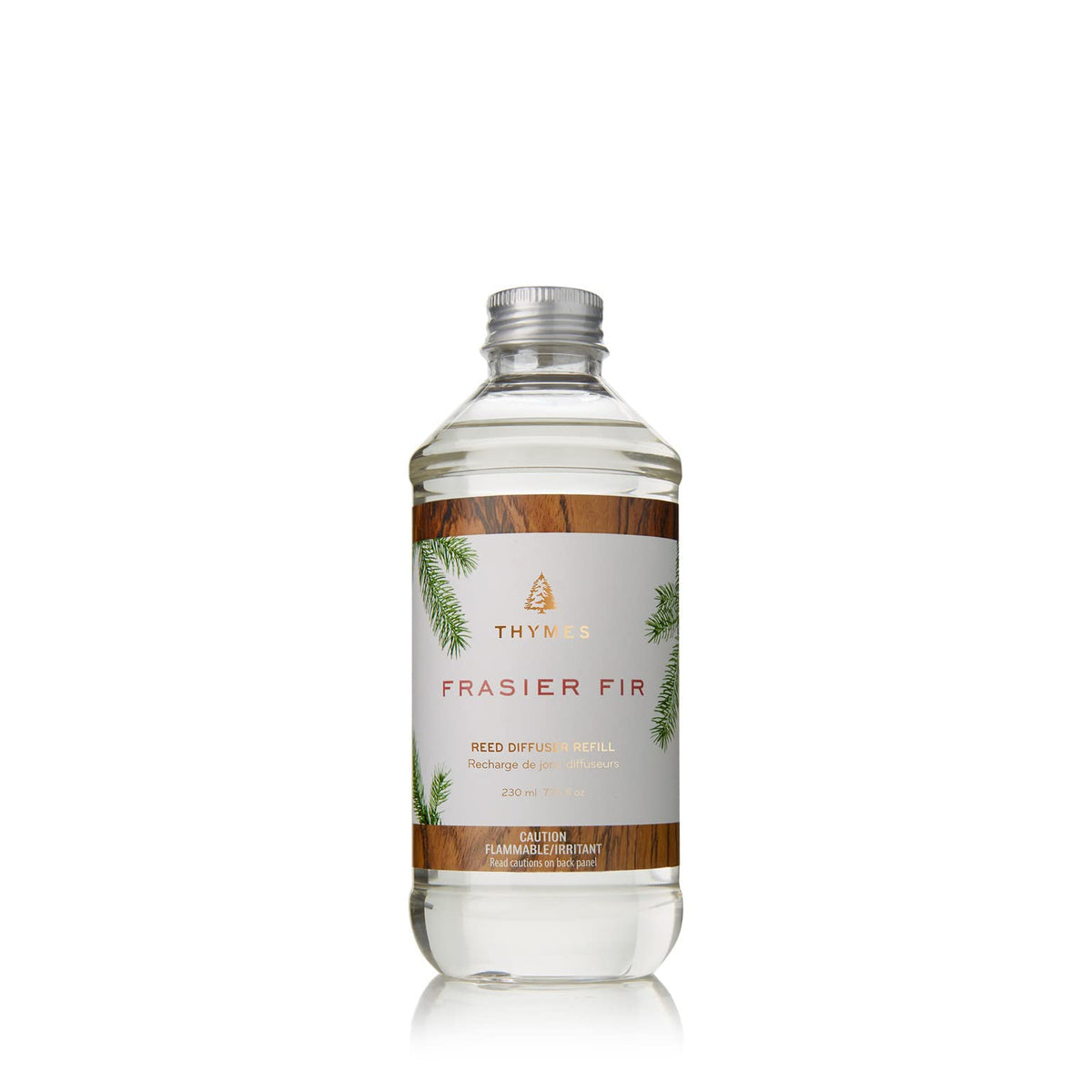 Thymes Frasier Fir diffuser oil refill bottle provides enduring pine aroma for a cozy space