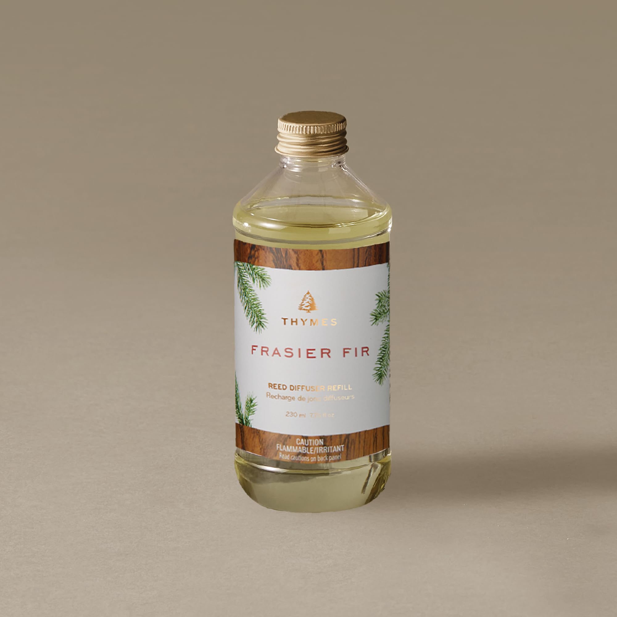 Thymes Frasier Fir diffuser reeds showing simple, maintenance-free diffusion
