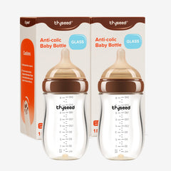 Thyseed anti-colic glass bottle with base vent for calmer, less gassy feeds.