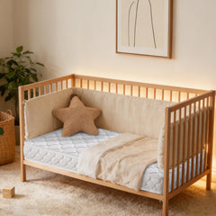 Tiankehan crib mattress side view highlighting compact profile and edge stability
