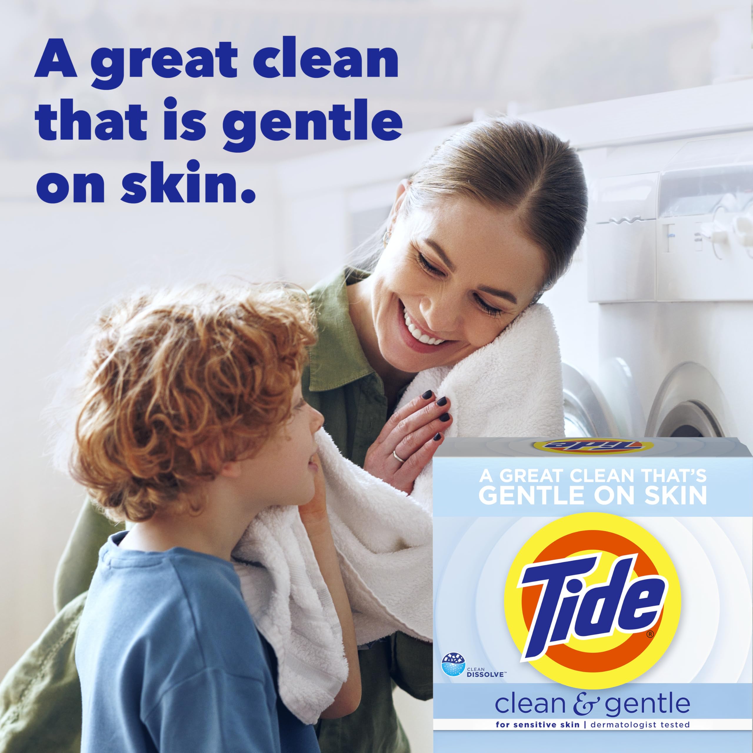 Pouring Tide Clean and Gentle powder into washing machine drum for a steady clean.