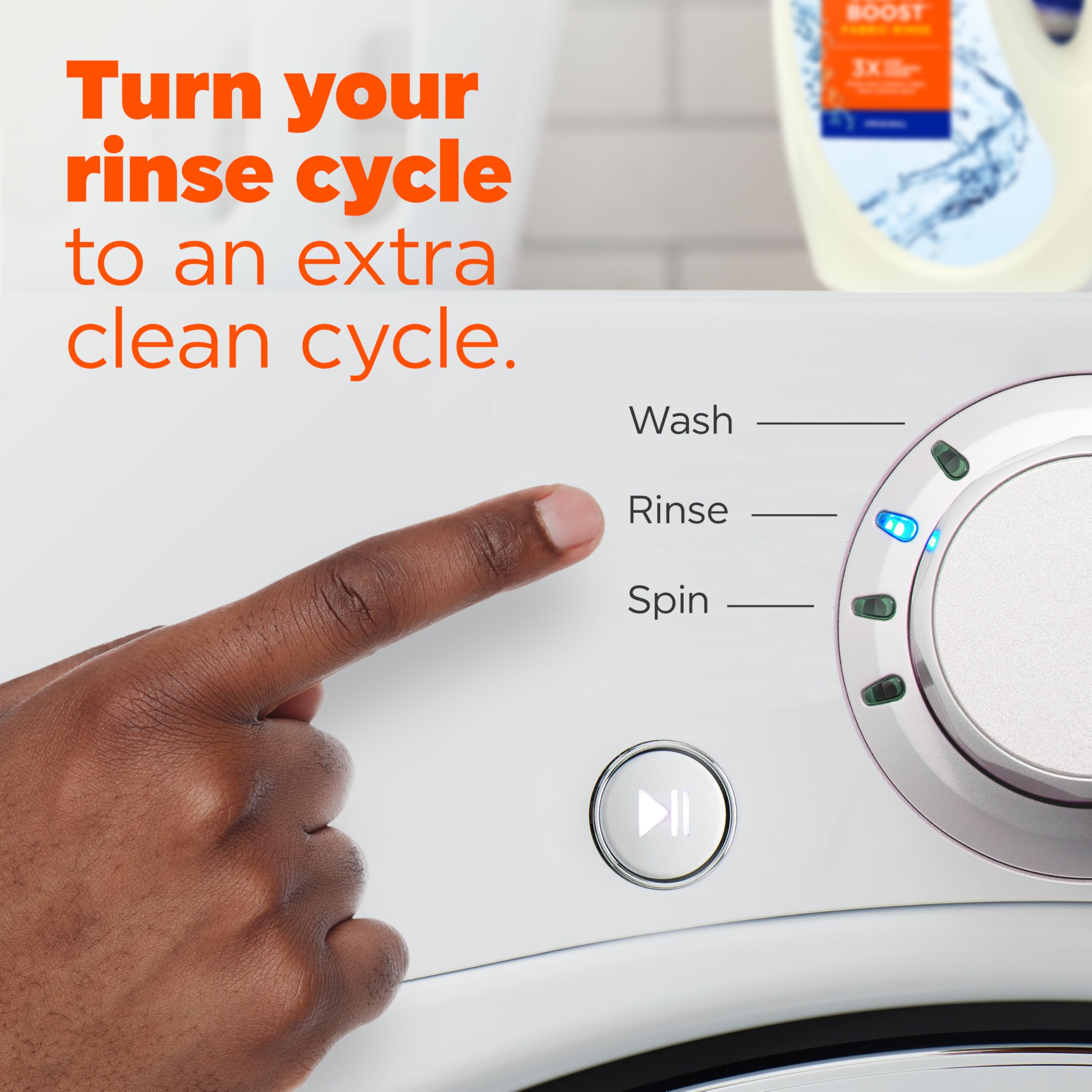 Tide Clean Boost bottle stored in a laundry cabinet for easy access