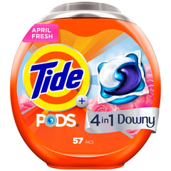 Tide PODS with Downy April Fresh pod in washing drum boosts stain removal and freshness.