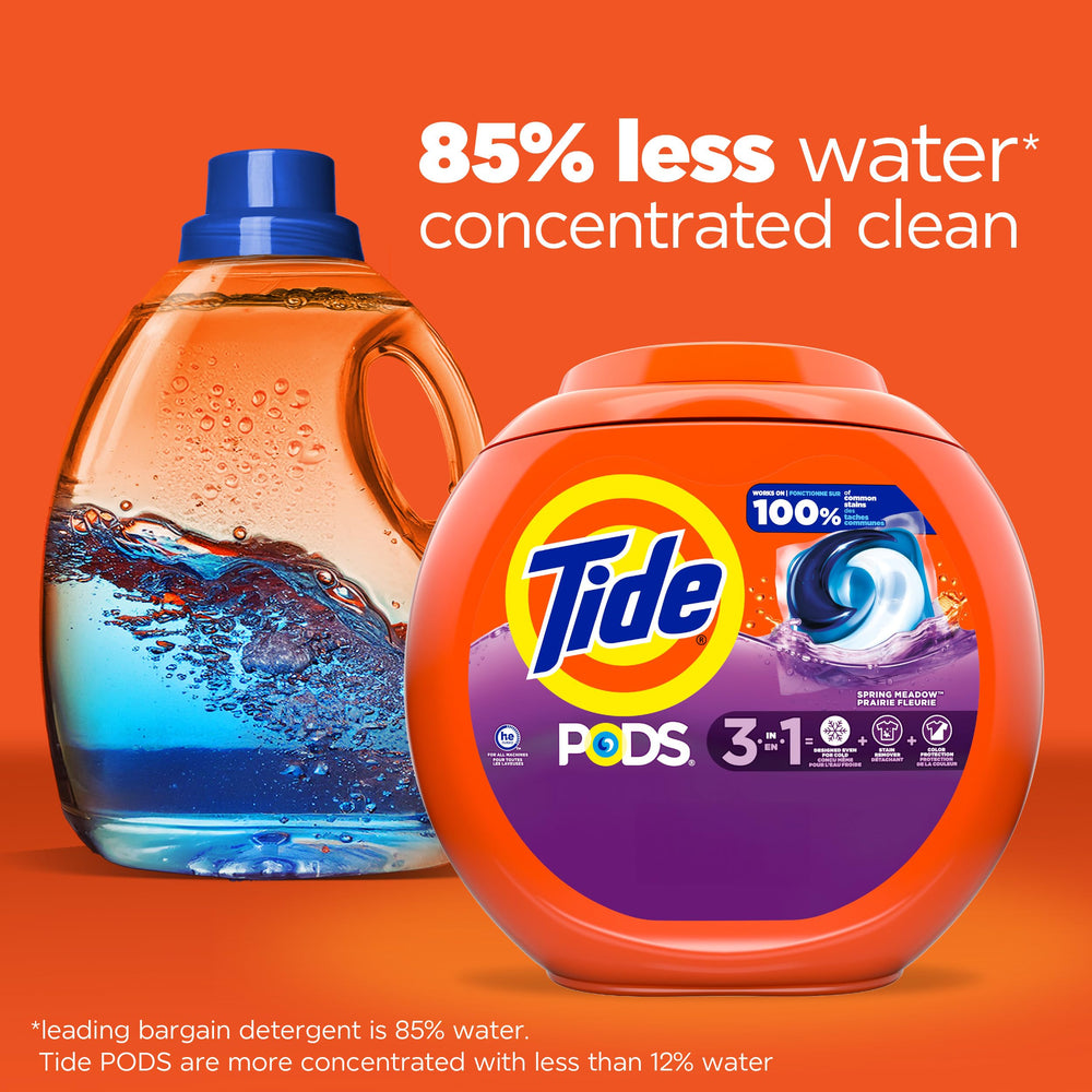 Tide PODS easy-to-use pacs dropped into drum
