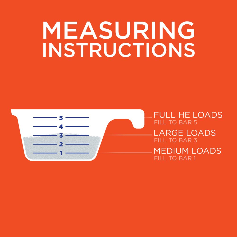 Measuring scoop with Tide Original Scent powder for precise dosing.