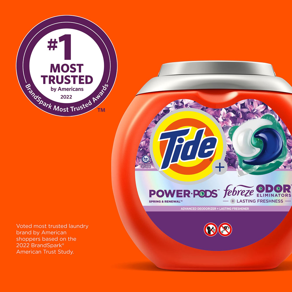 Tide Power Pods dispensing from package for easy use.