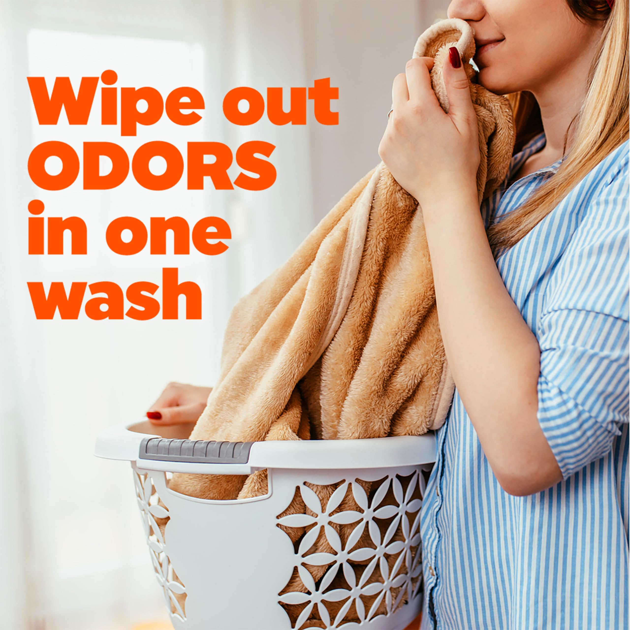 Tide Ultra Odor Defense Plus Oxi bottle on laundry room shelf.
