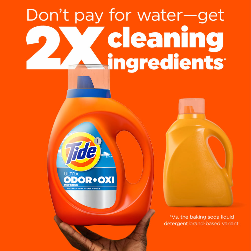 Tide Ultra Odor Defense Plus Oxi bottle paired with Downy for freshness.