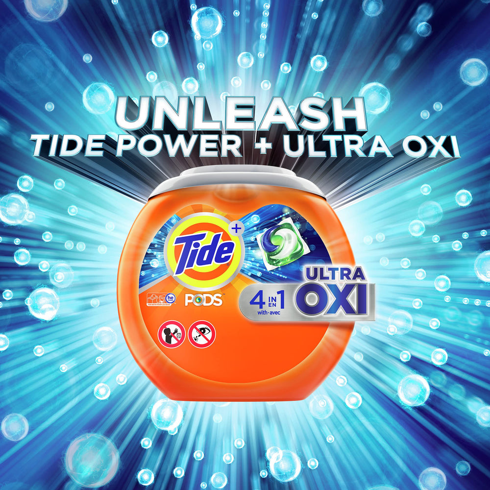 Tide Ultra Oxi PODS dissolving in water demonstrates fast cleaning in hot or cold cycles.