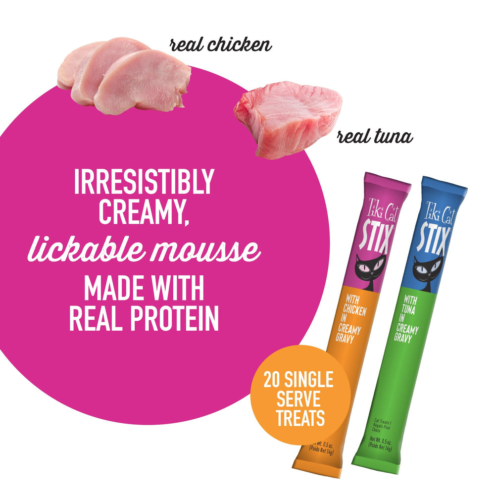 Serving hand shot with Tiki Cat Stix Mousse Treats for easy hand feeding