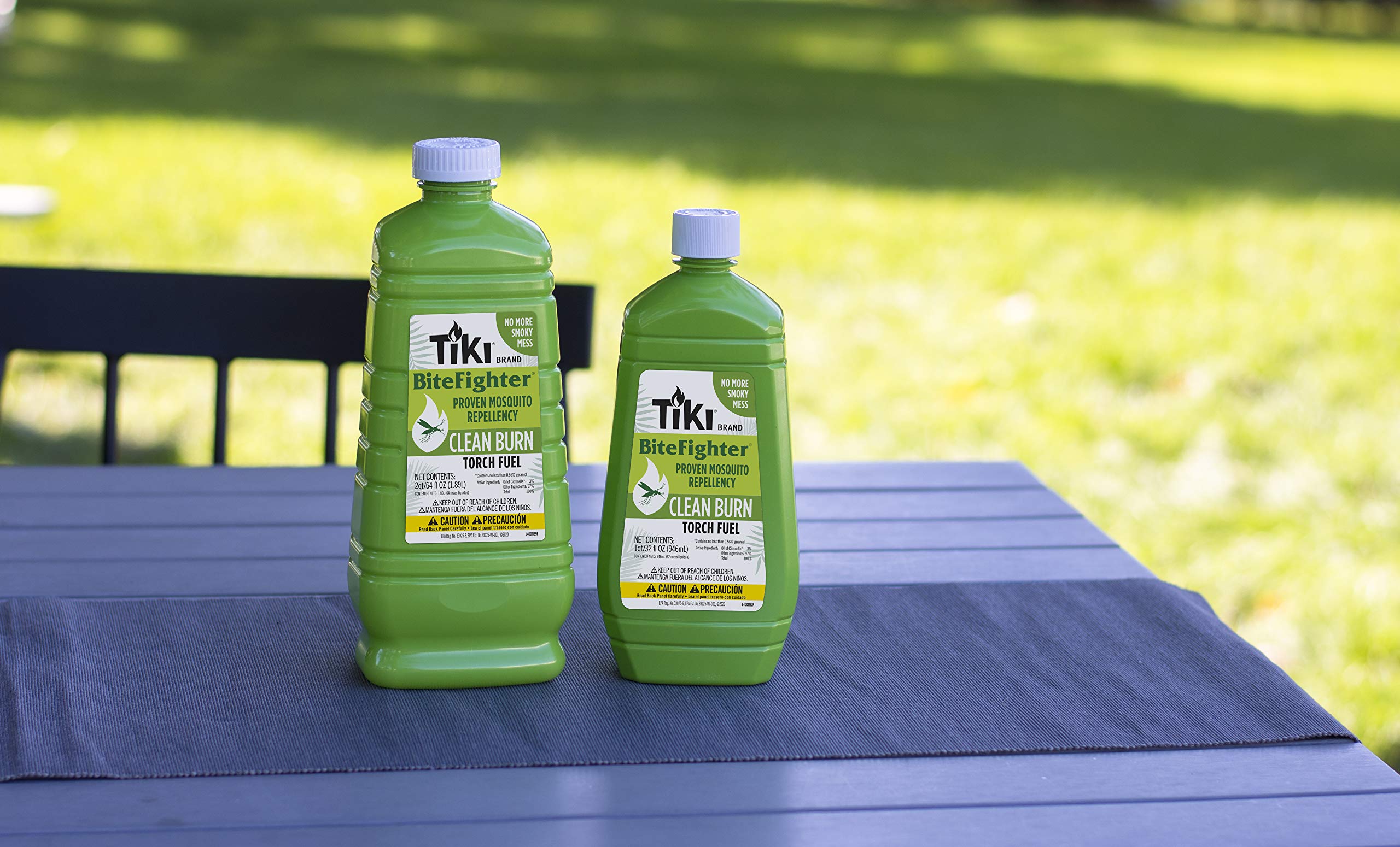 TIKI Clean Burn bottle label highlights 85% plant-based formula for cleaner burning outdoors.