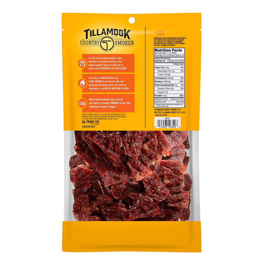 Tillamook beef jerky on-the-go snack pack held in hand, energizing moment.