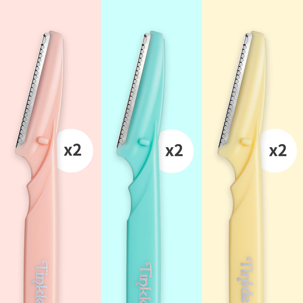Tinkle dermaplaning tool in compact case for travel touch-ups.