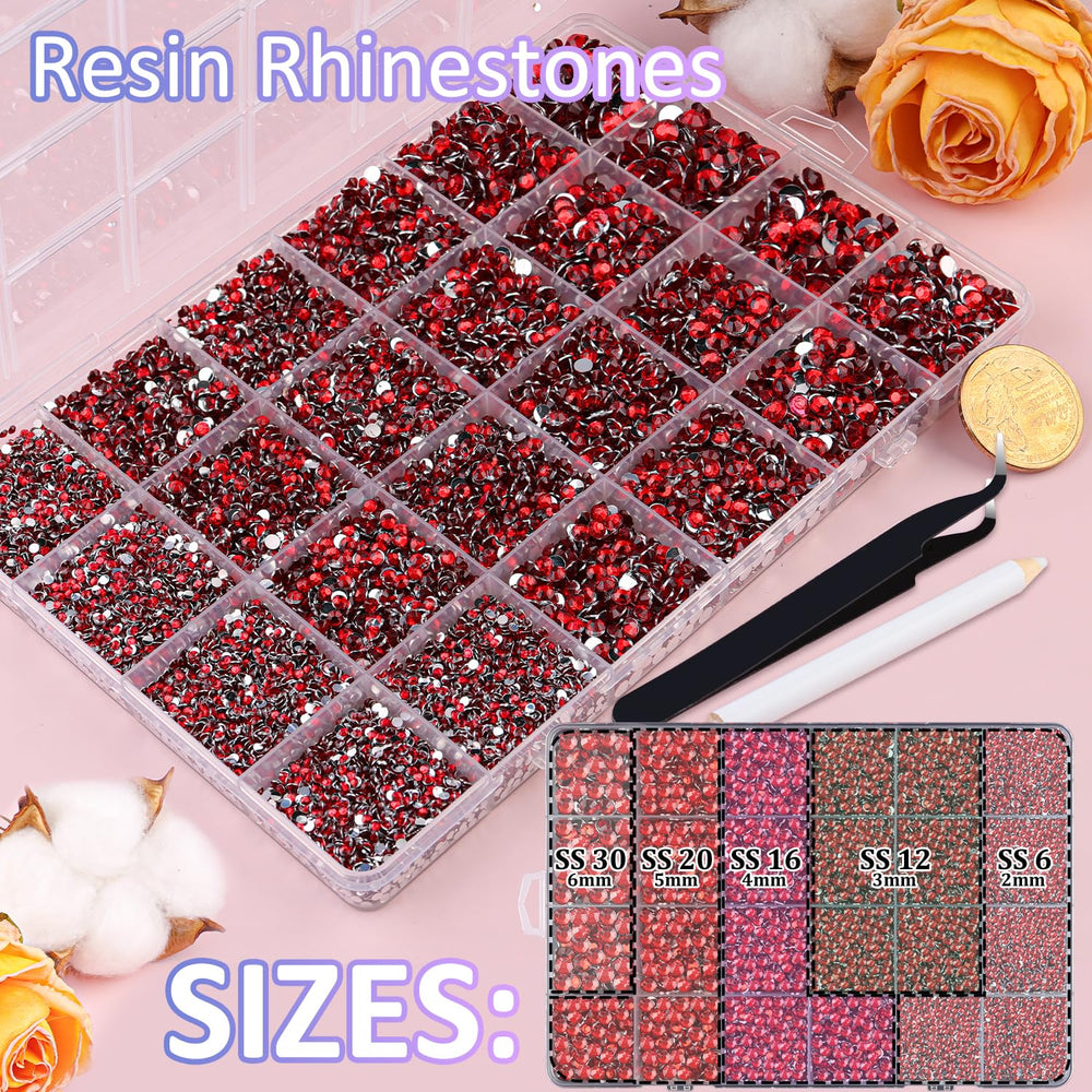 TINKRSTUFF tweezers and pickup pen for precise rhinestone placement.
