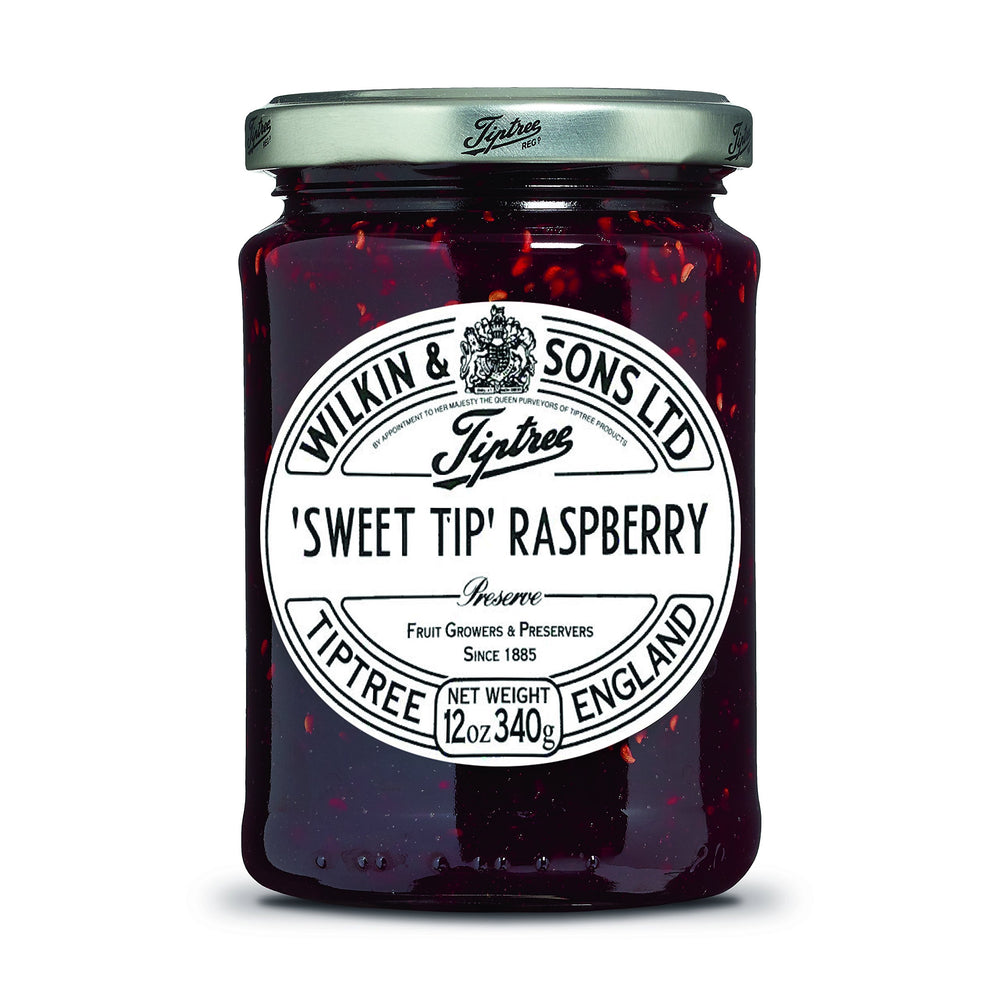 Tiptree Raspberry Preserve jar on toast, a quick breakfast treat.