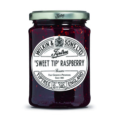 Tiptree Raspberry Preserve jar on toast, a quick breakfast treat.