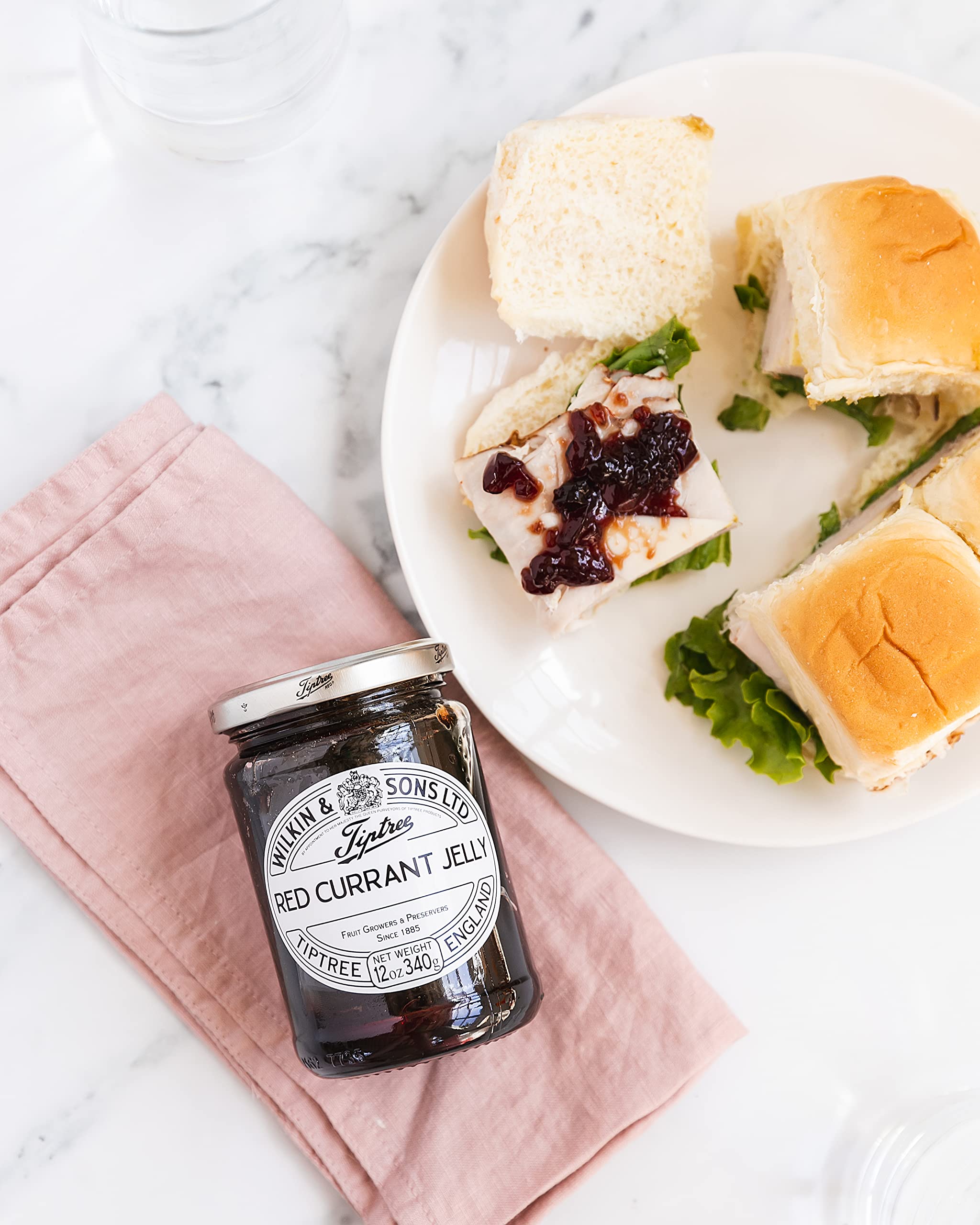 Tiptree Red Currant Jelly glaze on roast lamb adds subtle sweetness.