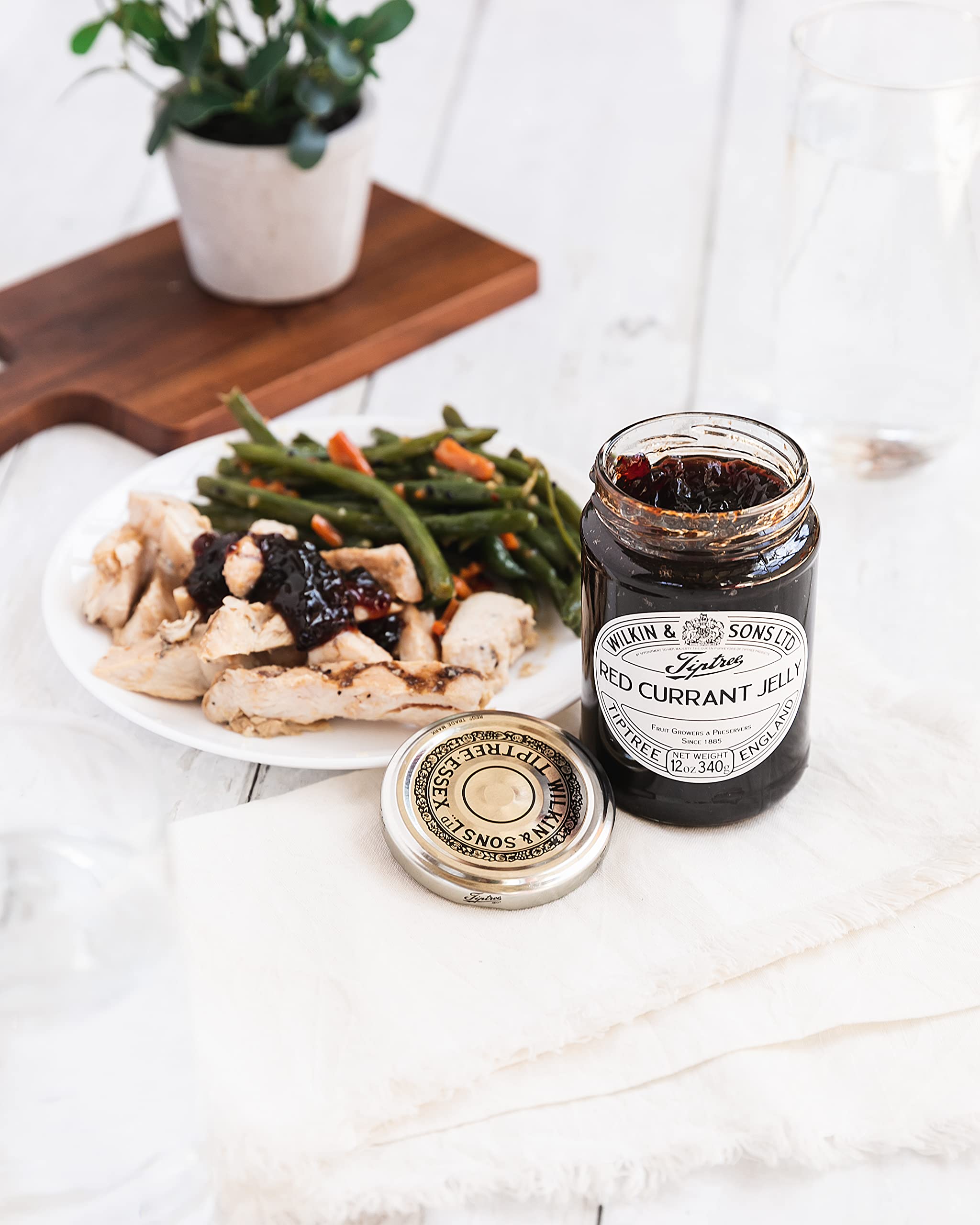 Tiptree Red Currant Jelly on a cheese board adds bright fruit balance.