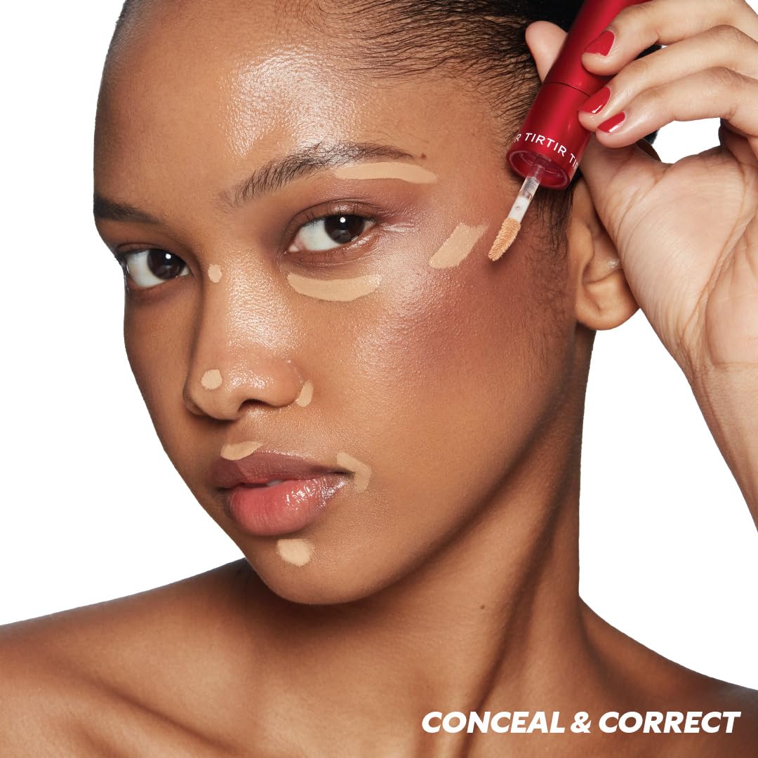TIRTIR Glide&Hide applicators in action on cheekbone for precision.