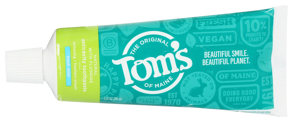 Tom's of Maine Fresh Mint travel-size toothpaste tube for on-the-go brushing.