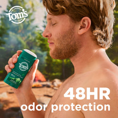 Smooth glide of North Woods deodorant applying to skin, clear finish.