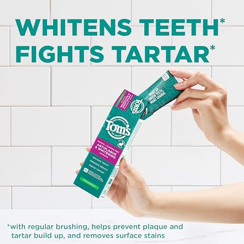 Tom’s of Maine spearmint toothpaste tube opened signaling refreshing breath after brushing