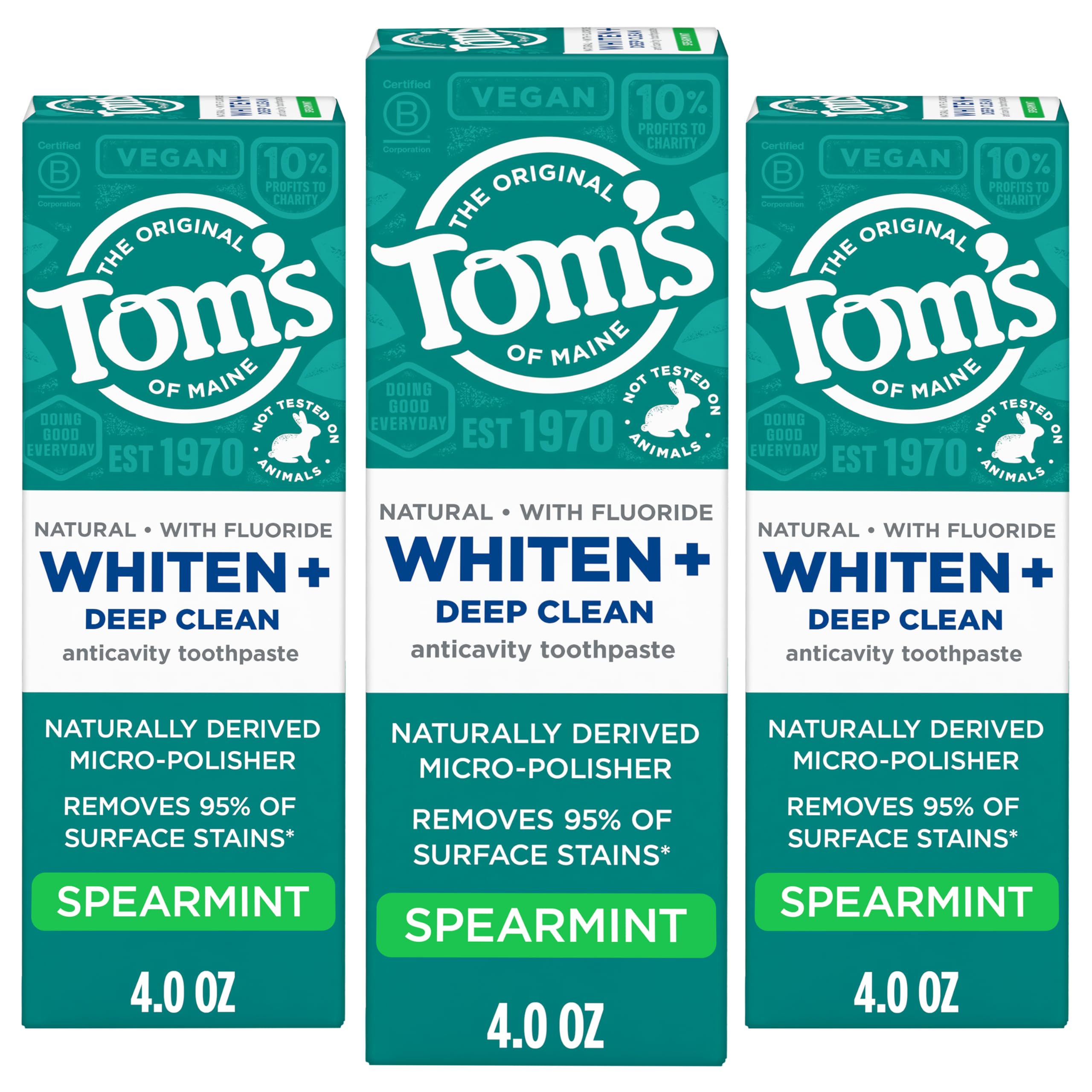 Mint leaves beside tube imply fresh spearmint aroma.