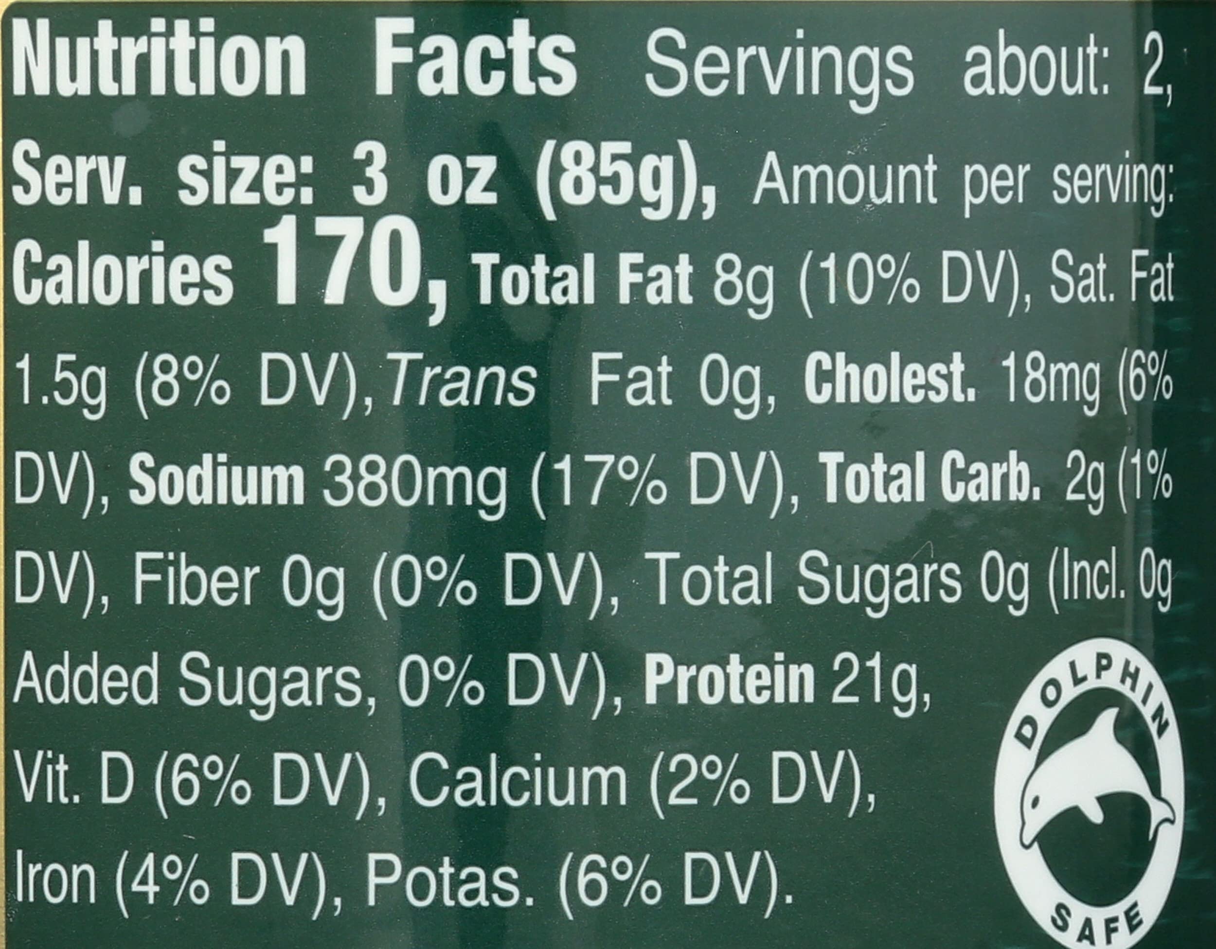 Tonnino Yellowfin Tuna oregano fillets close-up in olive oil ideal for salads.