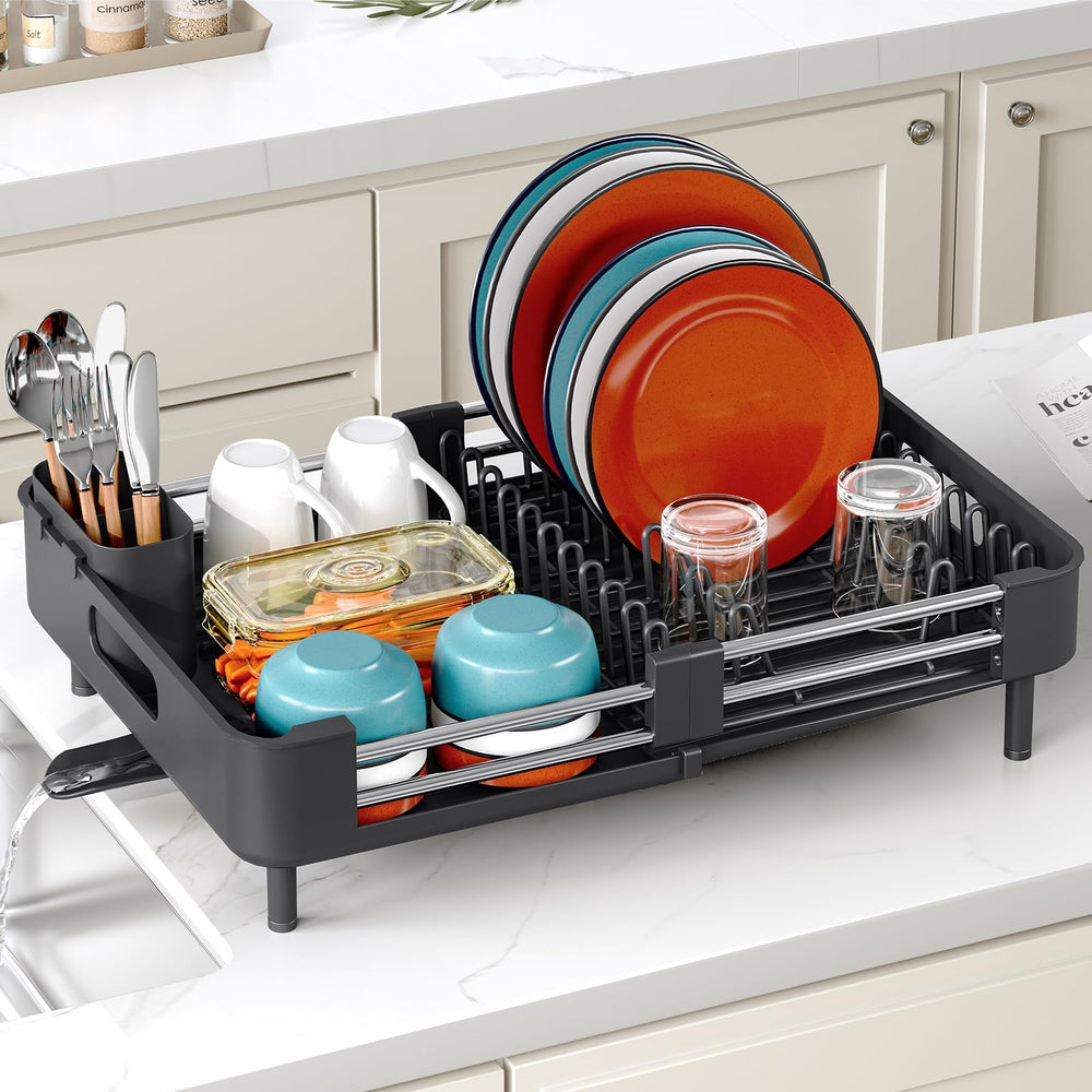 TOOLF dish rack drains directly into sink via spout.